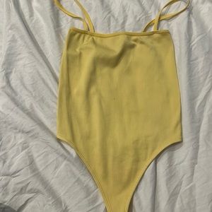 Yellow bodysuit